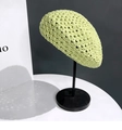 Detail of light green hollow knit beret showing breathable honeycomb texture on stand - M (56-58cm) / Green