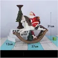 Babbo Natale su cavallo a dondolo in resina con regali decorazione natalizia altezza 31cm - Babbo Natale su Cavallo a Dondolo