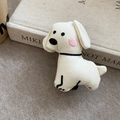 Detailed macro view of the cream white plush puppy hair clip with fabric texture - White Canvas Dog (Duckbill Clip)