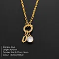 Elegant 14K gold stainless steel necklace with sparkling crystal and letter D pendant - Letter O