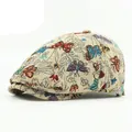 Ethnic retro beret hat featuring colorful butterfly jacquard patterns on beige fabric - One Size (Adjustable) / Beige