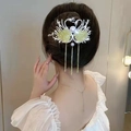 Elegant swan hair clip with yellow feathers, pearls and long gold chain tassels - Double Swan Twist Clip