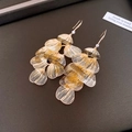 Élégantes boucles d'oreilles pendantes dorées à glands en forme de pétales ajourés - Crochets d'oreilles vintage à glands en pétales creux (2#) / Or