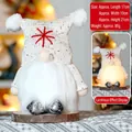 Glowing white knitted Christmas gnome with red snowflake embroidery, 21cm festive decor - Sequin Knitted Hat - Glowing Style C / Off White