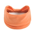 Dettaglio della fascia elastica in maglia arancione vivace con texture e pieghe elastiche - Arancione