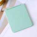 Miroir de maquillage pliant vert menthe avec finition mate dans un design rectangulaire - Vert