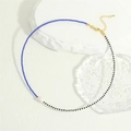 Detail of colorful glass beads necklace with irregular freshwater pearl and gold clasp - Blue And Black (NE2143-G)