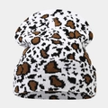 Dettaglio della trama con motivo mucca su un berretto in maglia spessa per l'inverno - Taglia unica / Stampa Leopardata Retrò Nero Marrone Bianco (2#)