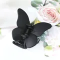 Elegant matte black butterfly hair claw clip for a stylish fairy-inspired updo hairstyle - Black