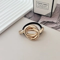 Minimalist elastic hair tie with a polished gold knot-shaped metal accent - Style G KC Gold