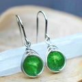 Minimalist silver wire-wrapped earrings with round translucent green gemstones - Green