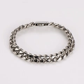 Macro shot of silver stainless steel Cuban link bracelet with a secure box clasp - Silver Steel Bracelet (8mm/22cm)