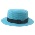 Close-up of sky blue boater straw hat featuring a black grosgrain ribbon and bow detail - Sky Blue