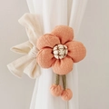 Detail of orange fabric flower curtain tieback with embroidery and small tassels - Korean Pink (Cotton Five-Petal Flower)