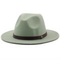 Detail of mint green wool fedora with a brown band and vintage metal badge on white background - M (56-58cm) / Milk White