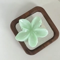Pale green plumeria flower hair claw clip with a glossy gradient finish for women - Bud Green [8cm Large]