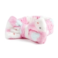 Close-up van roze en witte koraalvlies hoofdband met een zacht pluche strikontwerp - Roze Hond