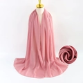 Pink pearl chiffon scarf draped on mannequin with close-up fabric texture detail - Pink