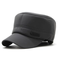 Close-up of windproof fabric and metallic logo detail on a men's winter flat top hat - Adjustable / Gray