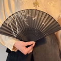 Classic black mesh folding fan with silver bamboo pattern and black silk tassel - Black Bamboo
