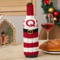 Red Christmas wine bottle cover with white knitted letter Q and black belt buckle decor - Letter Q