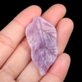Purple natural amethyst leaf carving pendant for DIY jewelry making on dark background - Lilac Stone