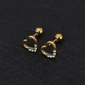 Macro detail of gold-toned heart ear studs with white rhinestones and screw-back closures - Heart - Gold