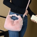 Chic pink faux fur handbag with leather handle and heart-shaped 'YOU' charm detail - Pink