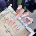 Macro shot of long trapezoid gradient pink nails with white flowers and silver glitter - By1609 Pink Moon Like A Flower / Glue Type