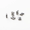 Macro view of six silver-toned metal letter E beads for DIY jewelry making accessories - Letter E / Silver Gray