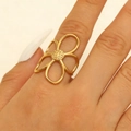 Minimalist gold hollow flower ring for women featuring intricate petal textures - Gold (S572)