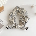 Beige cotton silk neck scarf with blue paisley pattern tied in an elegant knot - Beige Paisley