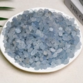 Natural blue crystal gravel stones in a white plate for home decoration and degaussing - Celestite (7-9mm) 100g