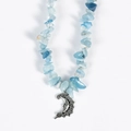 Irregular light blue gemstone beaded necklace with a detailed silver crescent moon charm - Aquamarine Moon