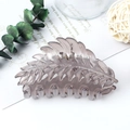 Smoky grey translucent leaf-shaped hair claw clip with matte finish and vein texture - Jelly Grey