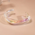 Detail view of iridescent acrylic open bangle with geometric irregular aurora finish - Triangle