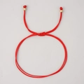 Handcrafted red minimalist braided bracelet with adjustable golden metal bead closure - Minimalist Red Braid Gold Bead (JS-B23111504A)