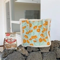Detail of floral tote bag with orange poppy patterns and soft sherpa fleece trim accents - Calla Lily Orange Floral