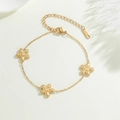 Elegante bracciale in acciaio inossidabile dorato con tre ciondoli a forma di fiore - Oro