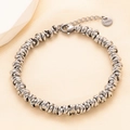 Silver stainless steel chain bracelet with spiral link design and lobster clasp closure - Silver (O110)