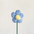 Handcrafted crochet puff flower in blue and yellow yarn with green stem for bouquets - Blue