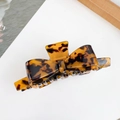 Vintage tortoiseshell acetate hair claw clip with large bow shape on white background - Large / Coffee Tortoise Shell