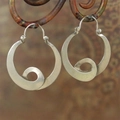 Vintage silver hollow curved hoop earrings with bohemian spiral design and hook closure - Spiral Round