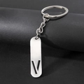 Polished silver metal keychain featuring a minimalist hollow letter V pendant design - Letter V