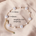 Detailed view of pearl bracelet on silk showing 4mm and 8mm sizes with 16+5cm length - Alternating Pearl Bracelet (4mm/8mm)