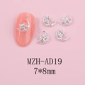 Close-up of 7x8mm silver alloy hollow star nail art charms with sparkling texture detail - Silver Moon Star (AD19)