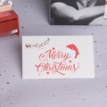 Minimalist Merry Christmas card with red font and holiday motifs on a white background - Merry Christmas Theme Envelope No.1