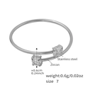 Polished stainless steel ring with 0.6cm white zircons in a crossover open design - A032-Silver Color Round Zirconia Ring