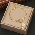 Golden Hamsa Hand bracelet with evil eye charms on a luxury jewelry box display - 1# Hamsa Hand (B496)
