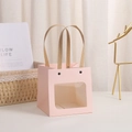 Pink square paper gift bag with a transparent window and a minimalist smiley face design - Open Window Pink 10x10x10cm